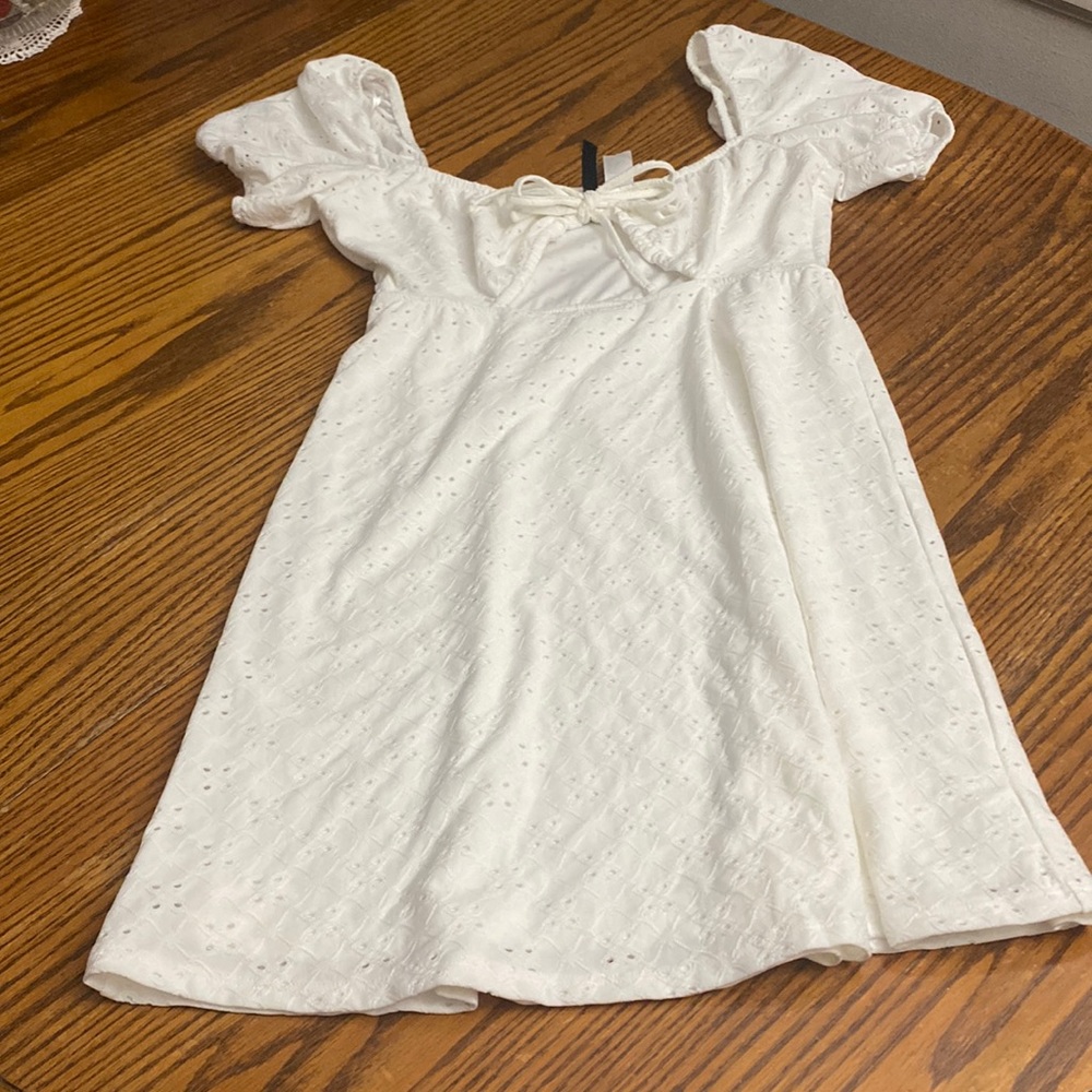 Off the solder white dividend dress. Cute for summer!